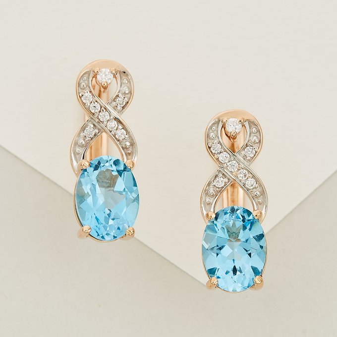 Серьги из красного золота 585 пробы c фианитами и 2 топазами