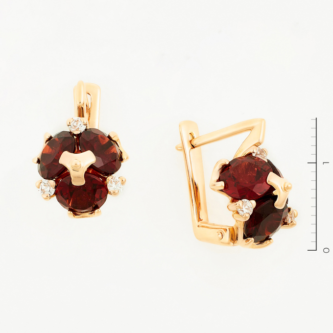 Серьги золото, 585, 2 к.,5,52 гр. (чистый вес 4,27 гр.) со следами износа; 6 Синт. камень Бесцветный, 6 Юв. кам. Красный