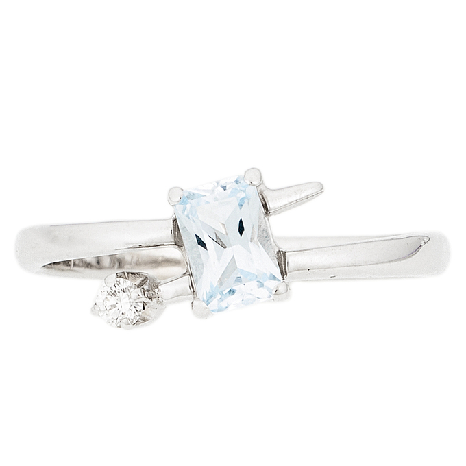 Кольцо из белого золота 585 пробы c 1 бриллиантом и 1 топазом