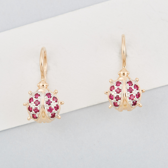 Серьги из комбинированного золота 585 пробы c корундами
