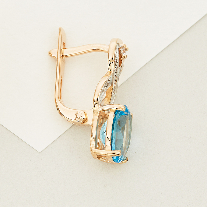 Серьги из красного золота 585 пробы c фианитами и 2 топазами