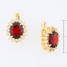 Серьги из золота 585 пробы c 2 гранатами и 32 топазами